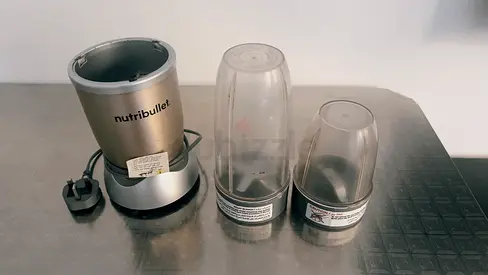 900w NutriBullet blender base with 2 cups and lids - excellent working condition