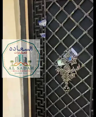 For sale: A house in Umm Khanoor, divided into two sections. The first section has 3 bedrooms, a living room, a majlis (formal sitting room), and a kitchen. The second section has 2 bedrooms, a living