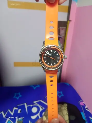 Orange silicone strap CK-style wristwatch, working condition