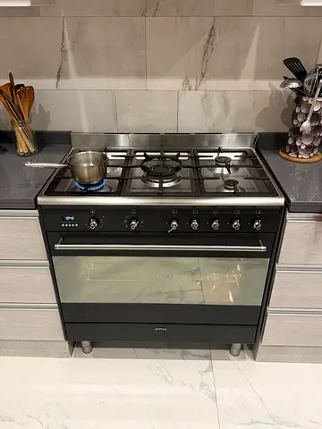 Smeg Stainless Steel 5-Burner Gas Range with Electric Oven - Good Condition