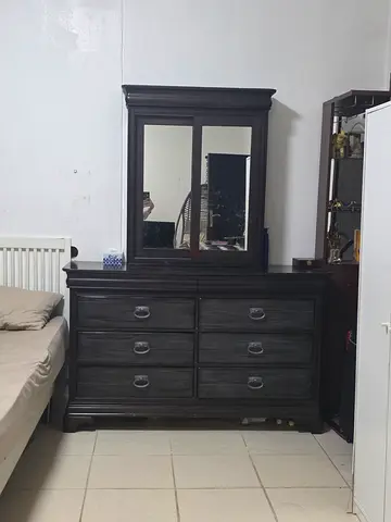 Solid dark wood dresser with mirror - 6 drawers, good condition