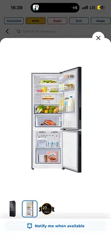 Good condition two-door refrigerator — spacious bottom freezer