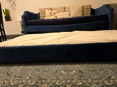 Blue velvet sofa bed / daybed in good condition