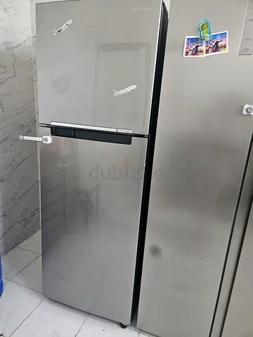 Silver double-door refrigerator - good working condition