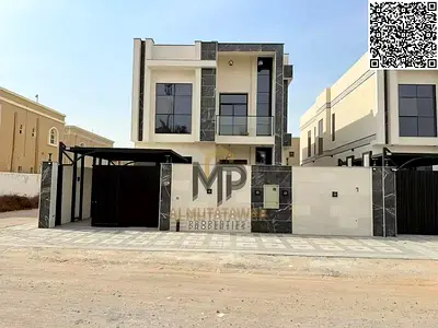 فيلا فاخرة للبيع في المويهات 3 – عجمان، على شارع وسكة جانبية، 5 غرف نوم ماستر، تكييف مركزي، تصميم راقٍ وموقع مميز،