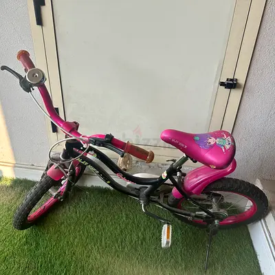 Pink and black 16”inches bicycle
