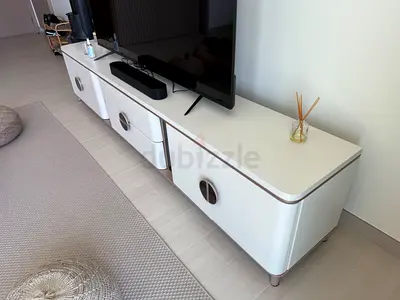 White modern low TV console with storage -very good condition fits 75in and over