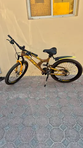 Used yellow/black mountain bike - good condition