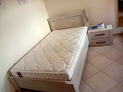 Single bed with matress and 1 night table