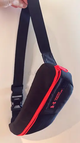 Under Armour small black waist/$%&!# pack with red zipper - good condition
