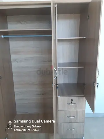Wooden 3-door wardrobe with drawers - good condition
