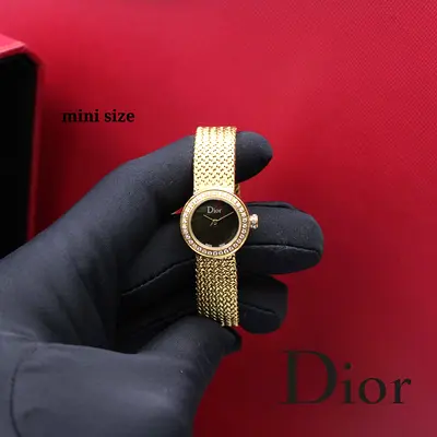 Dior mini gold-tone ladies wristwatch with black dial