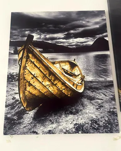 Framed Black & White Photo Print of Wooden Boat on Shore