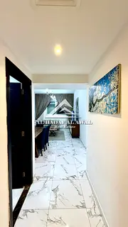 Available from the 18th: 1-bedroom apartment with 2 bathrooms and a balcony in Muwaileh Commercial, 