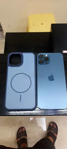 iPhone 12 Pro Max 128GB (Blue) with back cover- Good Condition .never opened never repaired 10/10