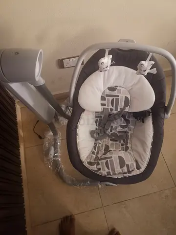 Joie Serena Swing and Bouncer - New rarely used electric baby swing with soft seat and toy bar