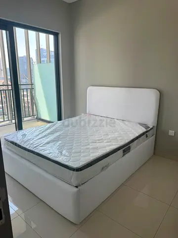 Queen bed frame with mattress - good condition with storage