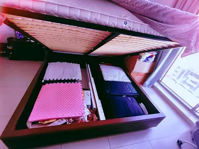 King storage bed with hydraulic lift, home center brand. Selling with mattress.