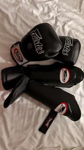 Muay Thai gloves and shinguards