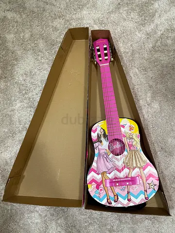 Kids guitar Barbie/ location Sharjah