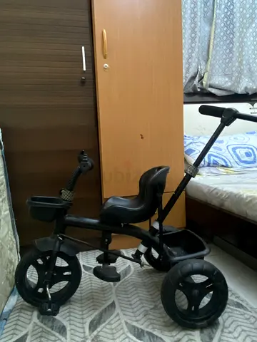 Kids push tricycle with handle — good condition