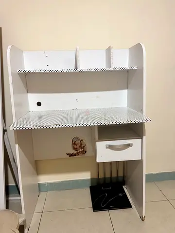 Compact white study desk with shelf and drawer