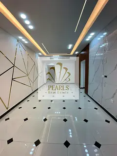 A luxurious 2-bedroom apartment with a living room is available for annual rent in Ajman – Al Rawd