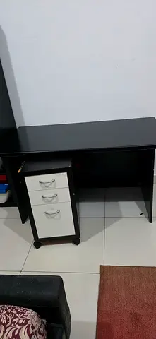 Compact black study table with 3-drawer storage — good condition