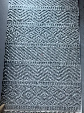 Light grey geometric patterned area rug - good condition