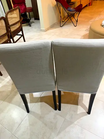 Ikea dining chair with one extra seat cover