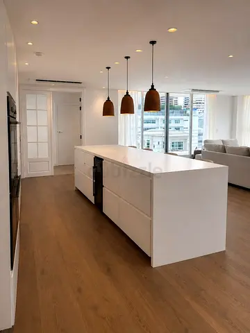 Modern White Kitchen Island with Integrated Storage