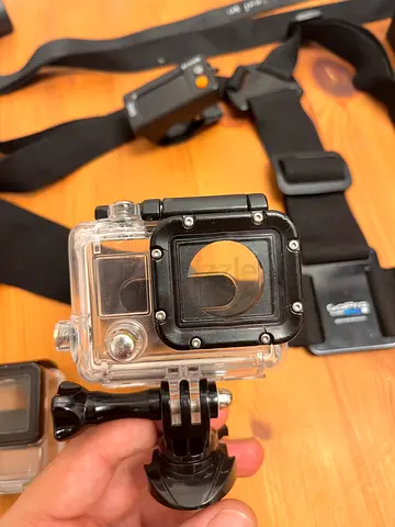 GoPro waterproof housing + chest strap mount (fits action cameras)