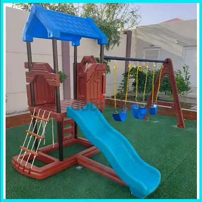 TREEHOUSE WITH SWINGS AND SLIDES