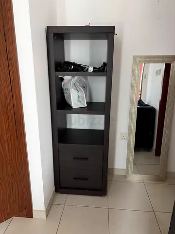 Tall Dark Wood Cabinet with Shelves and Drawer - Good Condition