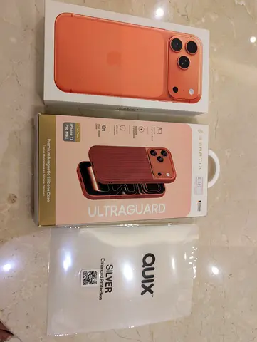 iPhone 17 Pro Max (cosmic orange) with 2 year apple care + case + protector - Brand New Boxed