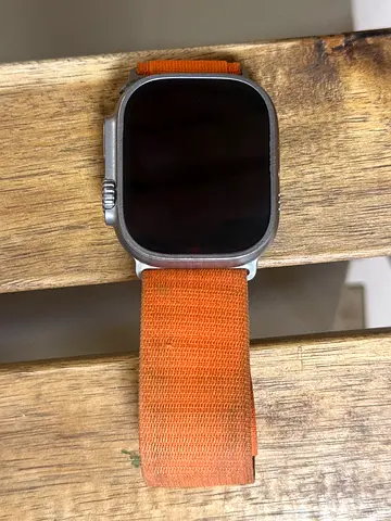 Apple Watch Ultra-style smartwatch with orange nylon strap - used