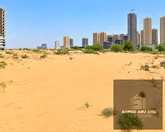 Residential and commercial land (G+25) in a prime location next to Al-Ghoroub Tower, with authorisat