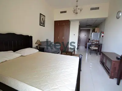 Furnished & Ready: Cozy Studio with Balcony in Sports City