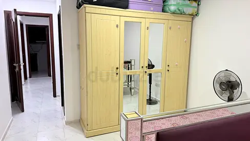 Light wood 4-door wardrobe with mirrored panels - good condition