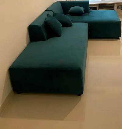 L-shaped dark green velvet sectional sofa - good condition