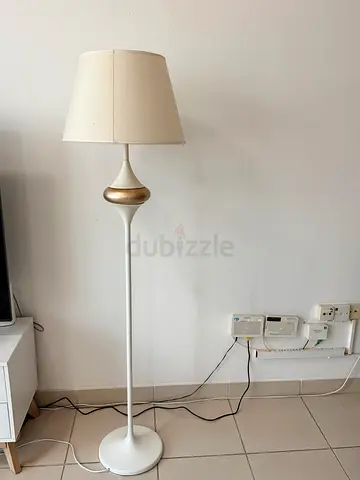 White floor lamp with beige fabric shade — good condition