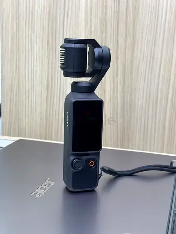 Handheld gimbal camera (DJI Pocket 4) in good condition
