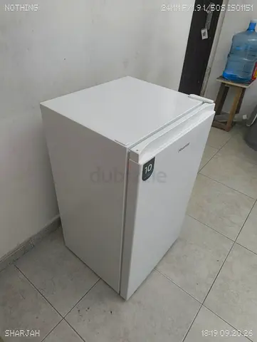 Small single-door refrigerator - compact white unit