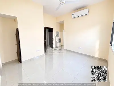 One-bedroom apartment (with a living room) for rent in Al Muwaihat 1, featuring a built-in wall closet; annual rent is 25,000.