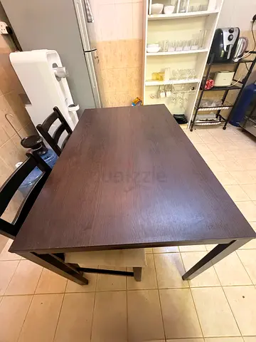 IKEA Dark wood dining table, seats 8 (extendable)— good condition