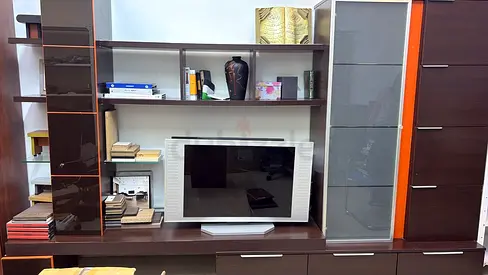 Large dark-wood TV unit center with shelving and glass cabinets