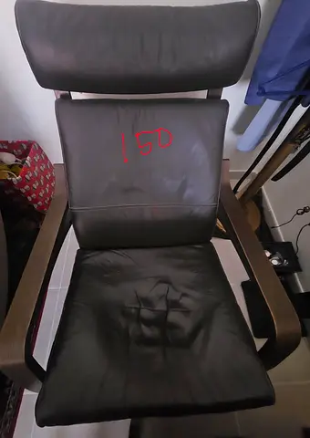 Black leather recliner/armchair with headrest - used, good condition