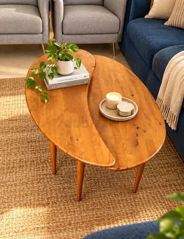 Mid-century solid wood kidney-shaped coffee table from OC home