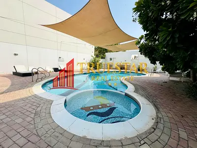 Shared Pool Private Garden 4BR+Maids Close to Beach & Umm Suqeim Park Compound Villa