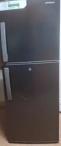 Used black double-door refrigerator - Excellent working condition